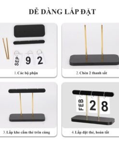 Lịch lật để bàn vĩnh cửu thiết kế tối giản, kết hợp đế đen và thanh kim loại vàng đồng sang trọng. Dễ dàng tháo lắp, decor góc làm việc cực chất. Mua ngay tại Co-Home Decor!